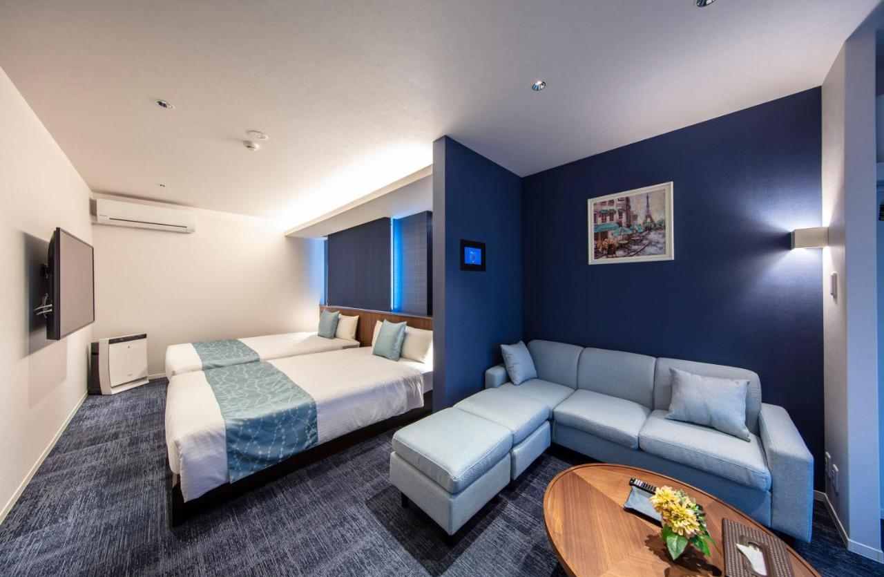 GRAND BASE Okayama Ekimae Lejlighedshotel Eksteriør billede
