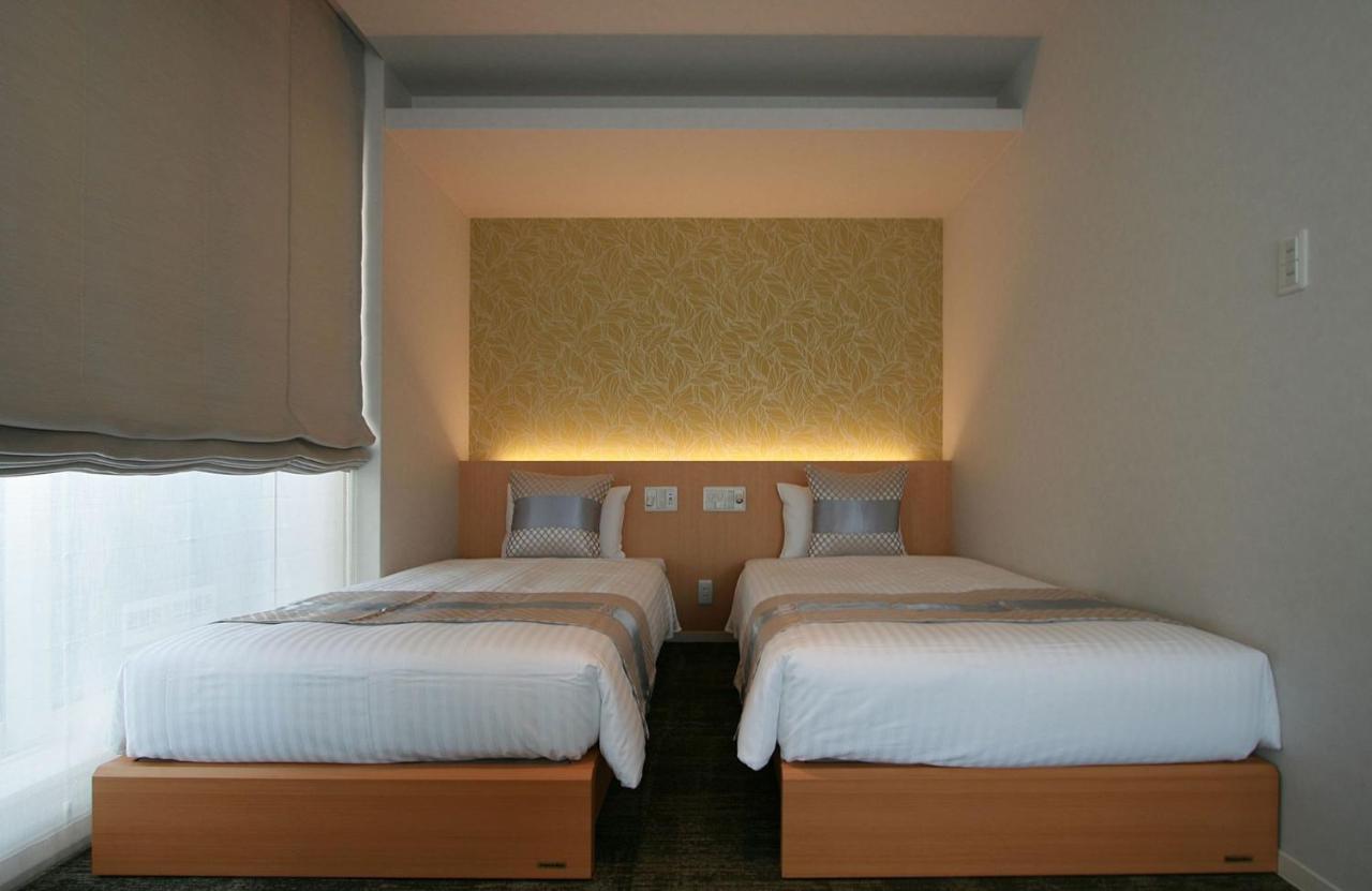 GRAND BASE Okayama Ekimae Lejlighedshotel Eksteriør billede