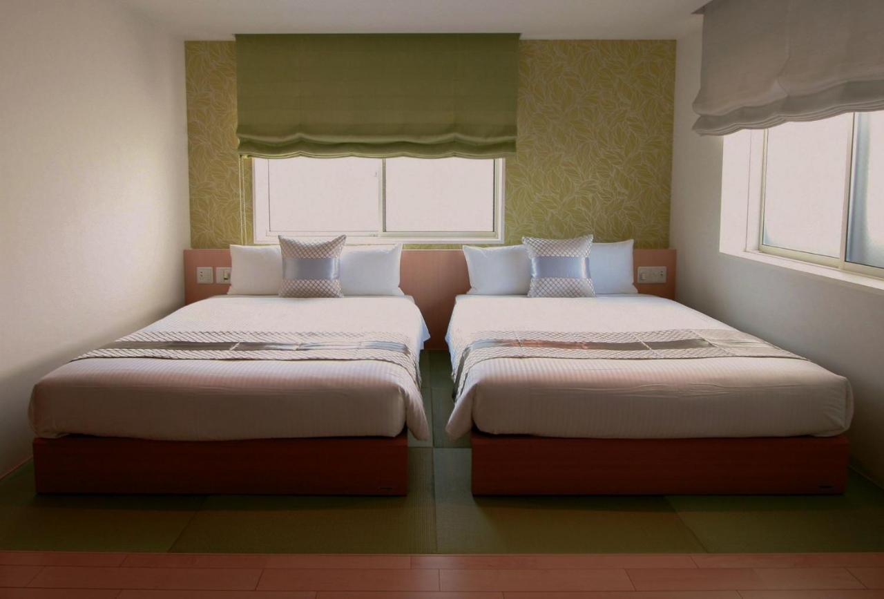 GRAND BASE Okayama Ekimae Lejlighedshotel Eksteriør billede