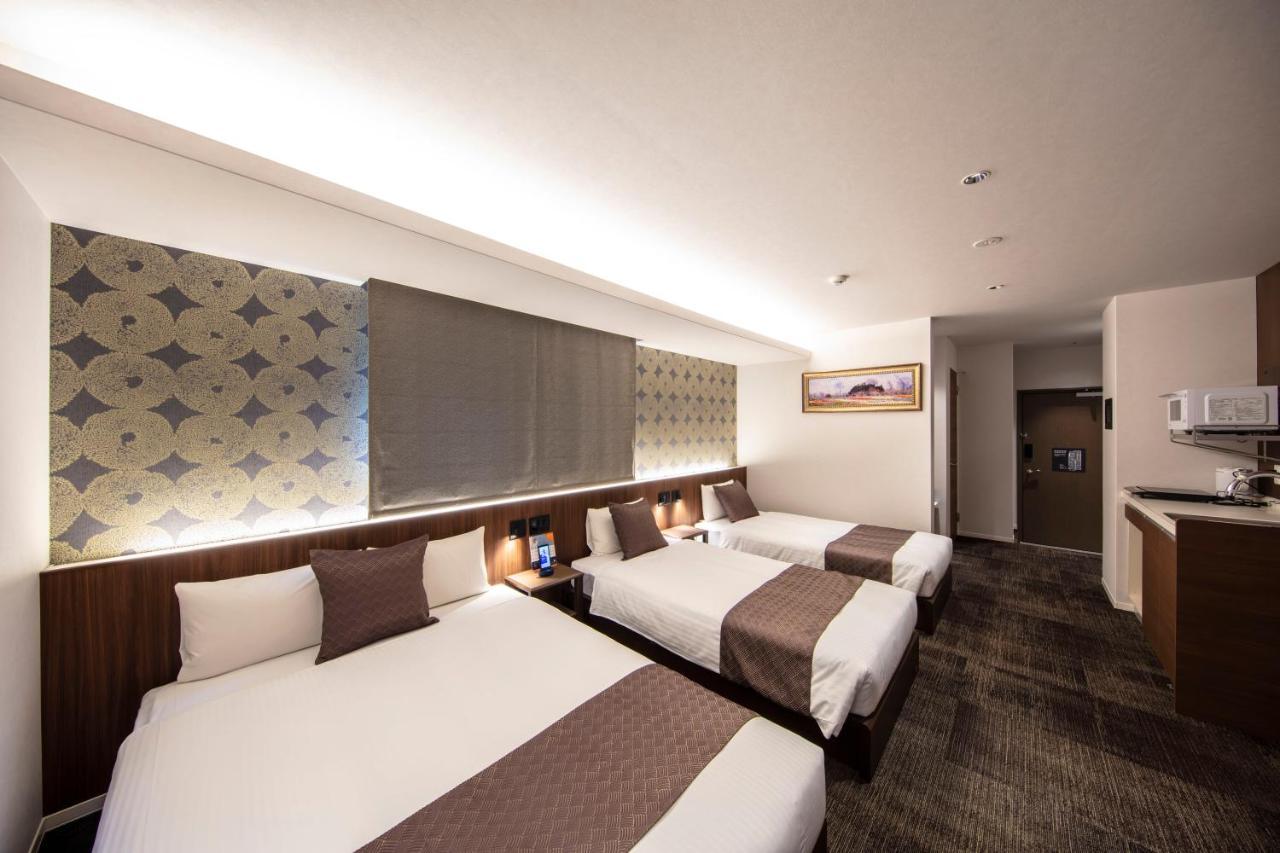 GRAND BASE Okayama Ekimae Lejlighedshotel Eksteriør billede
