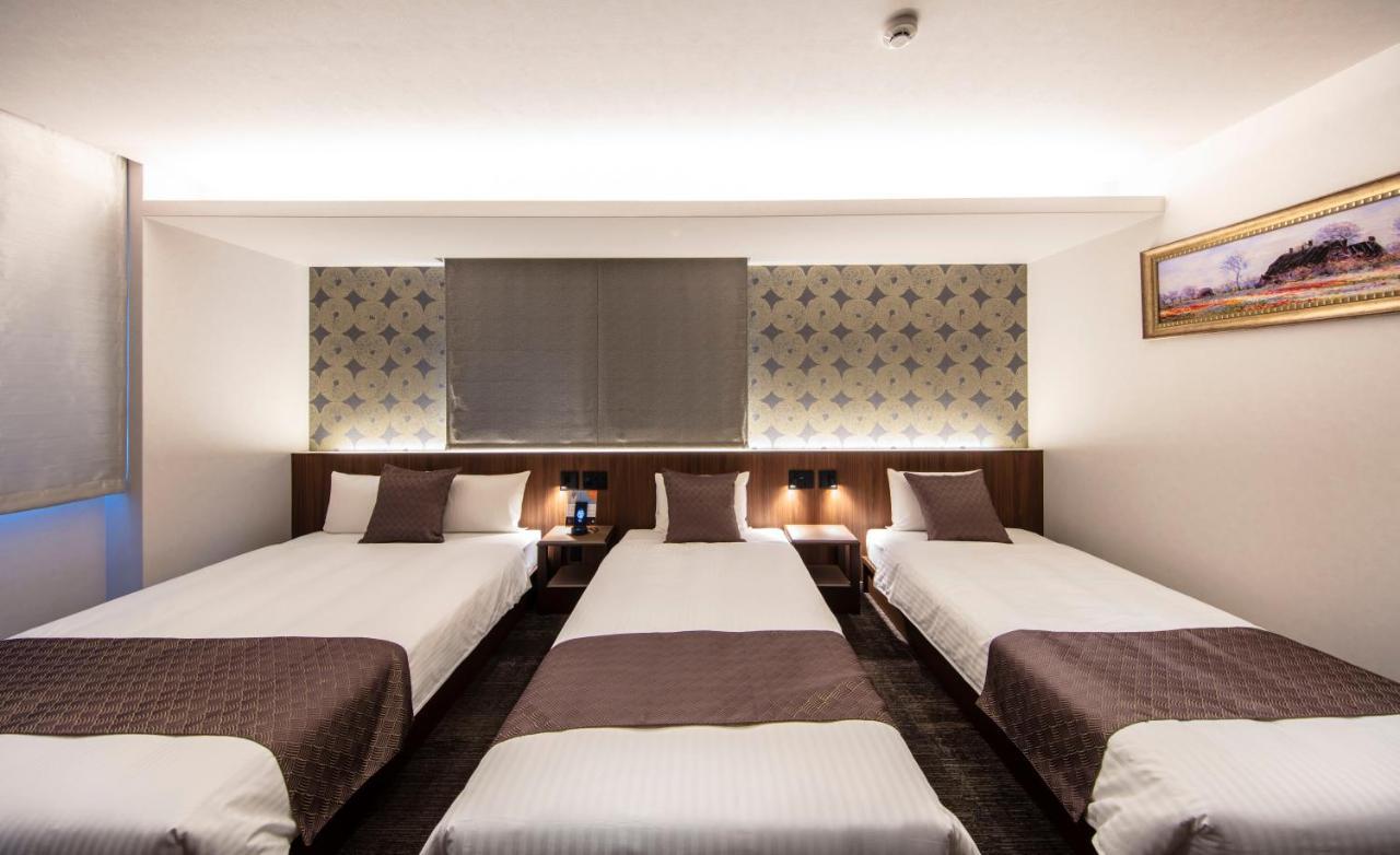 GRAND BASE Okayama Ekimae Lejlighedshotel Eksteriør billede