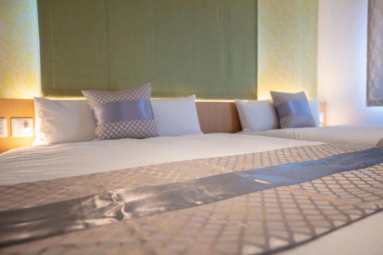 GRAND BASE Okayama Ekimae Lejlighedshotel Eksteriør billede