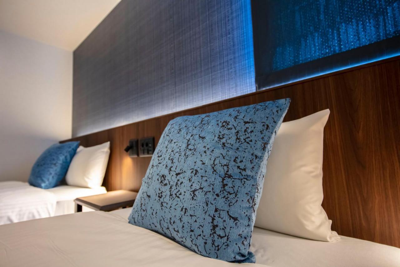 GRAND BASE Okayama Ekimae Lejlighedshotel Eksteriør billede